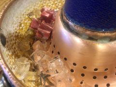 -毛辣果·贵州红酸汤牛肉火锅(西单店)