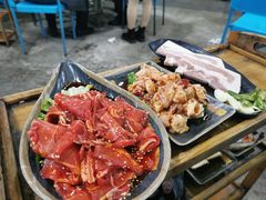 -彝人部落火盆烧烤(原内环足球场店)