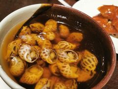 古越陈酿煮花螺-杭州西子湖四季酒店·金沙厅
