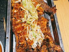 -明何记涮牛肚(品牌首店隋唐植物园南门古城路店)