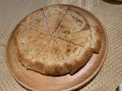 馕坑芝麻馕-巴扎美食·新疆菜·西域歌舞表演餐厅(新疆大厦店)