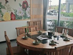 -明何记涮牛肚(品牌首店隋唐植物园南门古城路店)