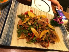 酸木瓜炒牛肉-紫滇源云南生态菜(丹凤街店)