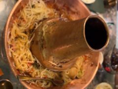 土司铜锅油焖鸡-浩海火烧云傣家菜(京广店)
