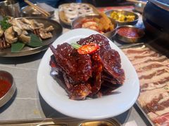 草家招牌酱辣蟹-草家酱蟹炭火烤肉店(珲春南路一店)