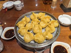 玉米面猪肉酸菜蒸饺-那家老院子东北菜·饺子·小鸡炖蘑菇(艳华街店)