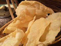 -老牌坊云南鱼豆花火锅(哈西万达店)