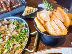 -曼听小寨海鲜烧烤·大连辣炒大王(盖州街店)
