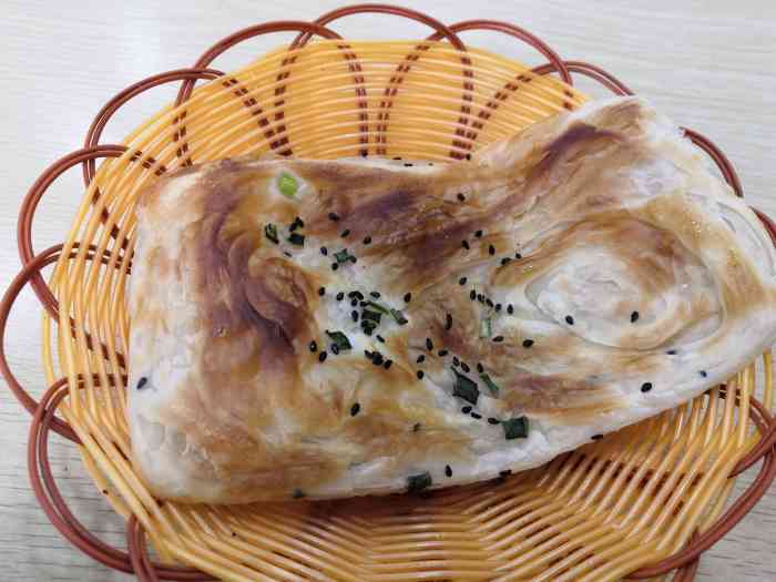 淮南牛肉汤特色锅贴烧饼-"这家店坐落在大庙弄清源拉面对面,第一次是.