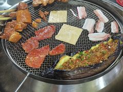 -彝人部落火盆烧烤(原内环足球场店)