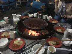-彝人部落火盆烧烤(原内环足球场店)