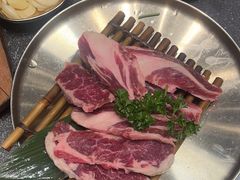 -草家酱蟹炭火烤肉店(珲春南路二店)