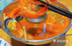 Signature Tom Yum Goong Seafood Soup