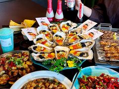 -曼听小寨海鲜烧烤·大连辣炒大王(盖州街店)