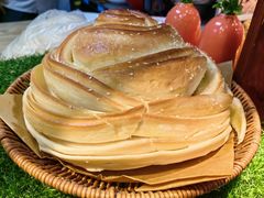 烤大花卷-那家老院子东北菜·饺子·小鸡炖蘑菇(艳华街店)