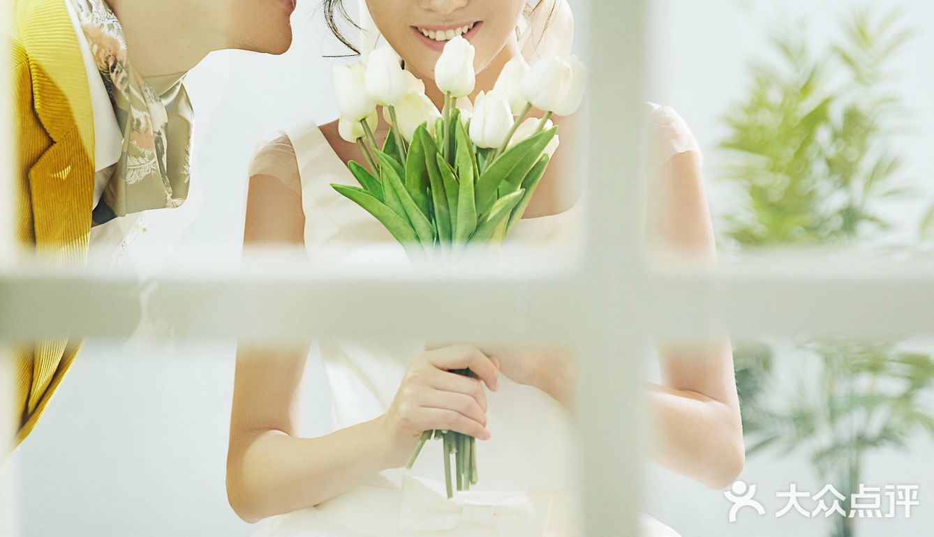 亚果婚纱摄影