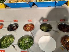 -明何记涮牛肚(品牌首店隋唐植物园南门古城路店)