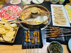 -明何记涮牛肚(品牌首店隋唐植物园南门古城路店)