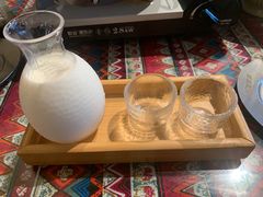 云南纂新奶白酒-火塘云南烧烤大排档