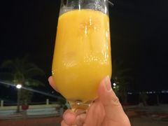 鲜榨芒果汁-越海渔村