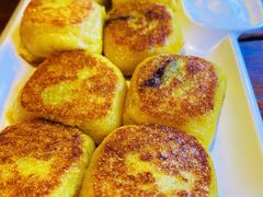 煎粘豆包-闯关东东北农家菜(崂山石老人店)