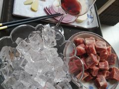 -毛辣果·贵州红酸汤牛肉火锅(西单店)