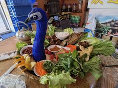 -沐毫傣泐云南菜孔雀宴•手抓饭傣味烧烤(曼听公园店)
