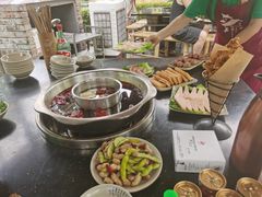 -茅草房·河畔园林火锅