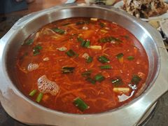 -黄利砖万峰林布依特色酸笋牛肉馆