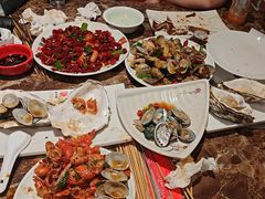 葱炒蚬子-潮庭·大连海鲜·炭火烧烤·扇贝王(大连店)