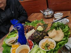 -沐毫傣泐云南菜孔雀宴•手抓饭傣味烧烤(曼听公园店)
