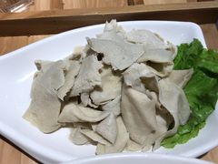 -明何记涮牛肚(品牌首店隋唐植物园南门古城路店)