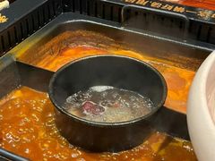 -老牌坊云南鱼豆花火锅(哈西万达店)