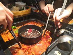 -老牌坊云南鱼豆花火锅(哈西万达店)