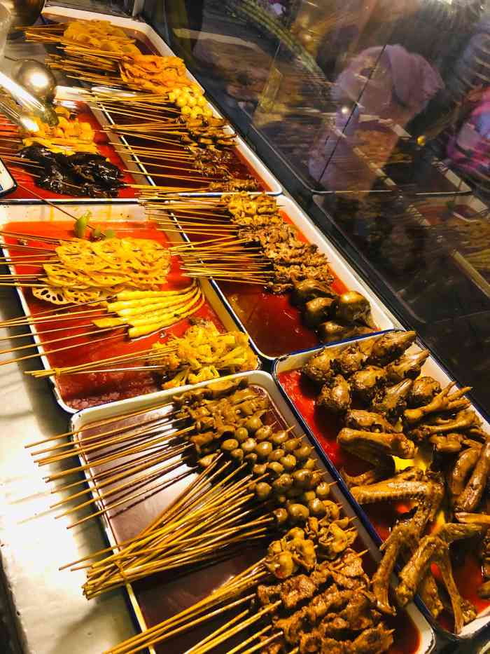 闻手辣卤串兔头-"这家摊摊在牛市口也摆着,属于流动小摊,一.