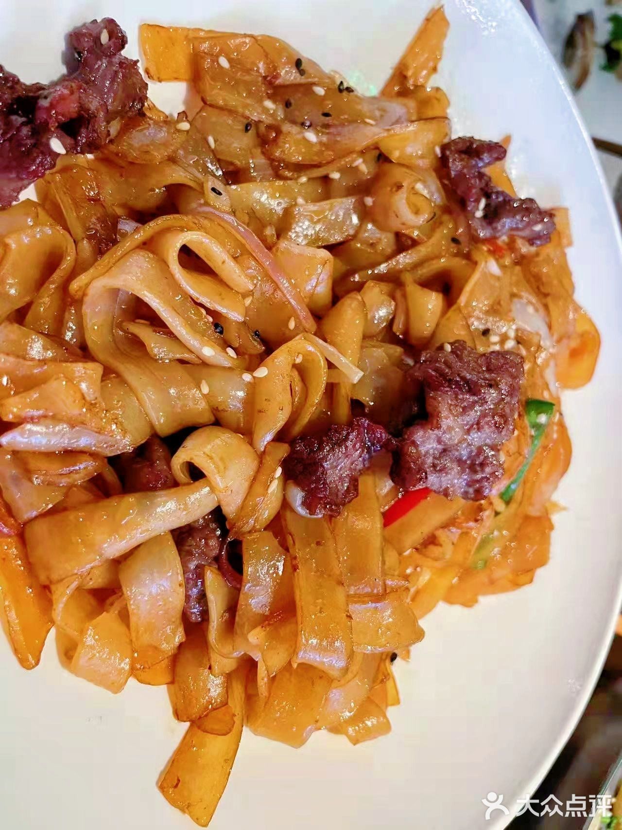 牛肉火锅吃过瘾[得意]左庭右院第100家店
