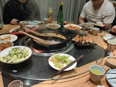 -明何记涮牛肚(品牌首店隋唐植物园南门古城路店)