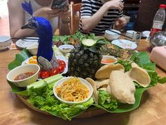 -沐毫傣泐云南菜孔雀宴•手抓饭傣味烧烤(曼听公园店)