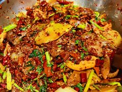 爆辣干锅鸭头-安诚居干锅鸭头(八角店)
