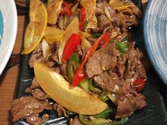 酸木瓜炒牛肉-紫滇源云南生态菜(丹凤街店)