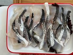 滑嫩黑鱼片-毛辣果·贵州红酸汤牛肉火锅(西单店)