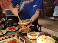-老牌坊云南鱼豆花火锅(哈西万达店)