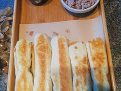 虾酱卷子-渔民船说·北塘海鲜·天津菜·海肠捞饭(北塘古镇店)