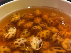 古越陈酿煮花螺-杭州西子湖四季酒店·金沙厅