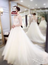 -觅白婚纱礼服馆