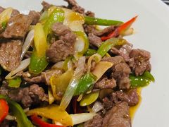 酸木瓜炒牛肉-紫滇源云南生态菜(丹凤街店)