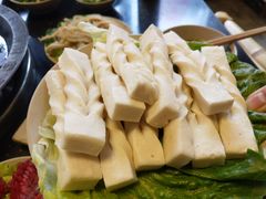 -茅草房·河畔园林火锅