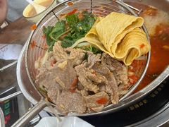 -黄利砖万峰林布依特色酸笋牛肉馆