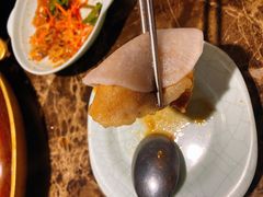 腌萝卜片-猪啊牛呀羊啊铜盘烤肉(正大广场店)