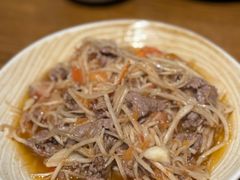 酸笋丝炒牛肉片-金孔雀德宏傣味餐馆(魏公村店)